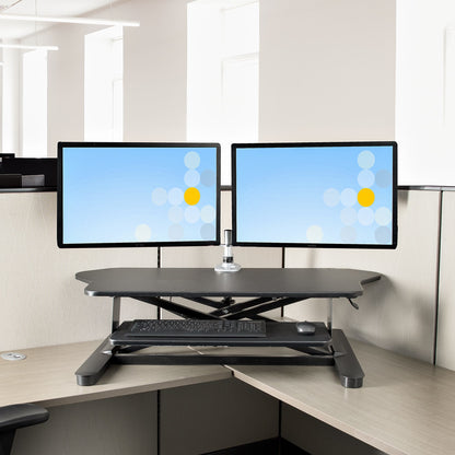 StarTech.com Corner Sit Stand Desk Converter with Keyboard Tray - Large Surface (35" x 21") - Height Adjustable Ergonomic Desktop/Tabletop Standing Workstation - Supports Dual Monitors